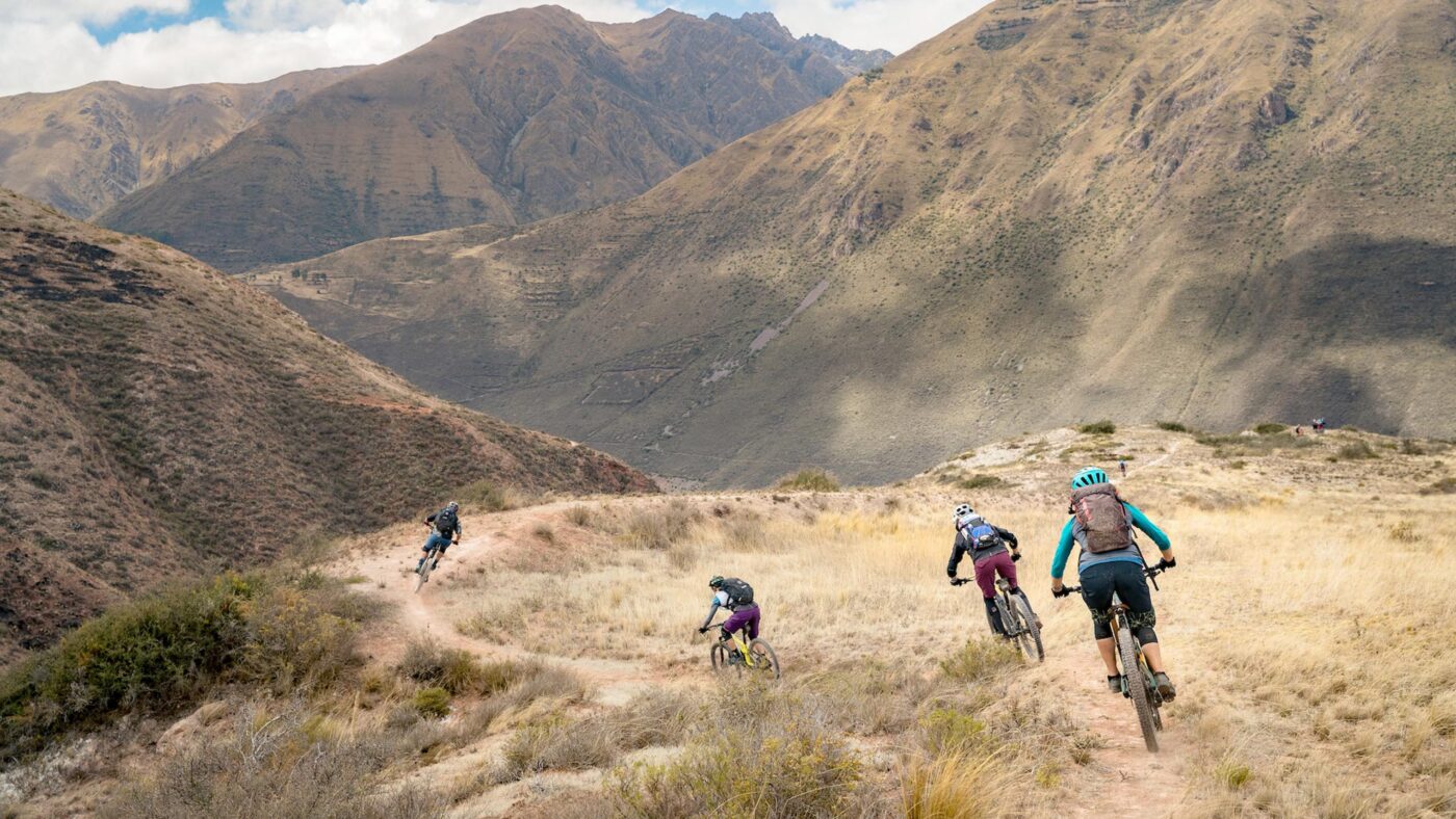Women riding in the Andes on a Sweet Skills mountain bike camp